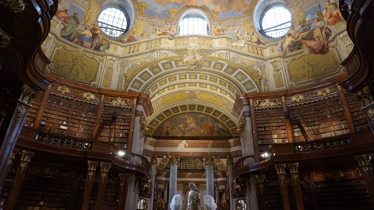 Baroque library with a frescoed ceiling